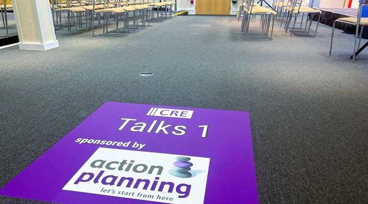 Help visitors wayfind around your event space with on-brand colourful and informative temporary floor graphics