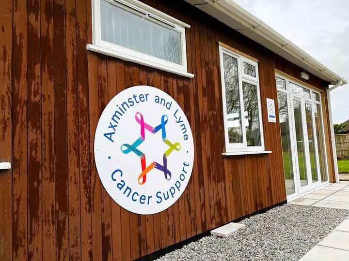 Axminster &amp; Lyme Cancer Support New Location in Axminster ACM Signage.jpg