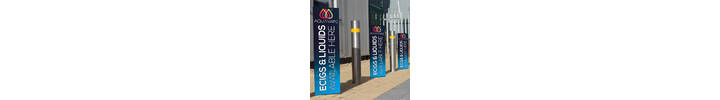 Bollard Wraps in retail car park showing Aquavape artwork.jpg