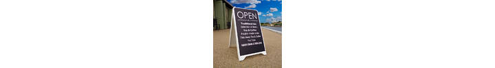 Budget A-Board at the seafront showing pub artwork.jpg