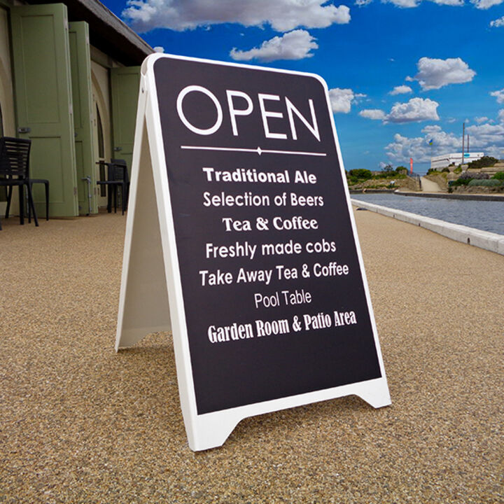 Budget A-Board at the seafront showing pub artwork.jpg