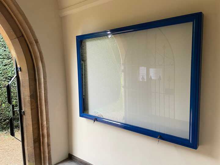 Wall Mounted External Noticeboard With Powder Coated Blue Frame and Grey Felt for local Church