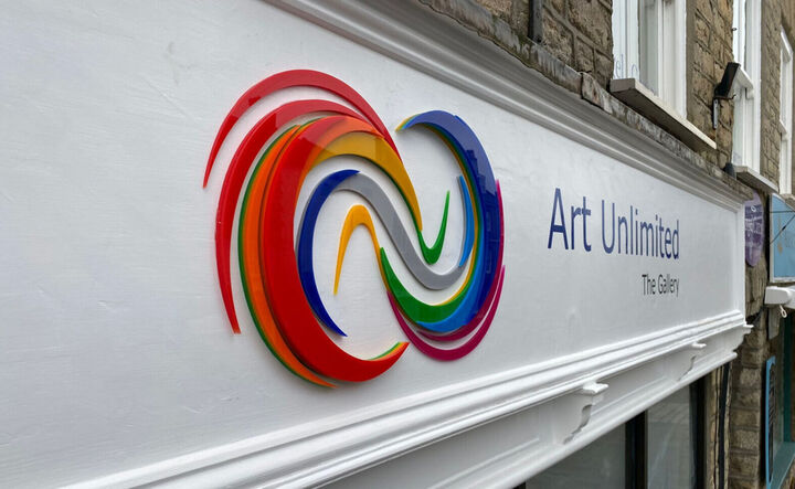 Flat Cut Multi-Coloured Acrylic Logo Creation For Arts Unlimited.jpeg