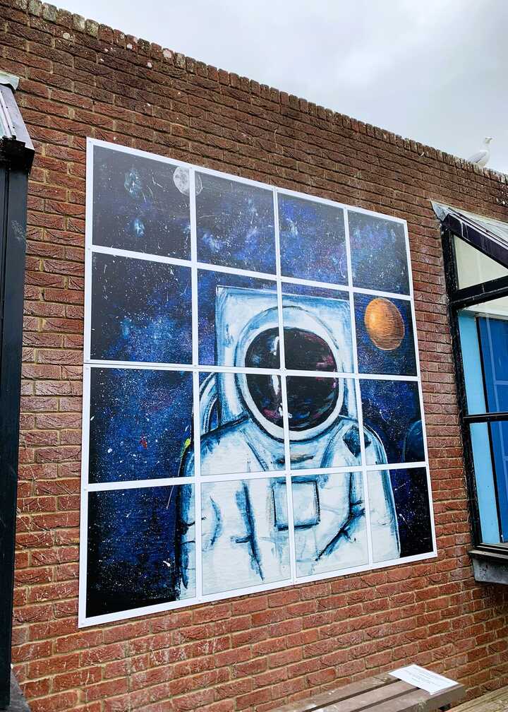 External ACM Artwork Prints for School - Astronaut looking through window