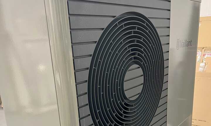 Vinyl Wrapping for a Vaillant aroTHERM Plus Air Source Heat Pump: A Custom Cement Grey Wrap for Bridport Property Renovation