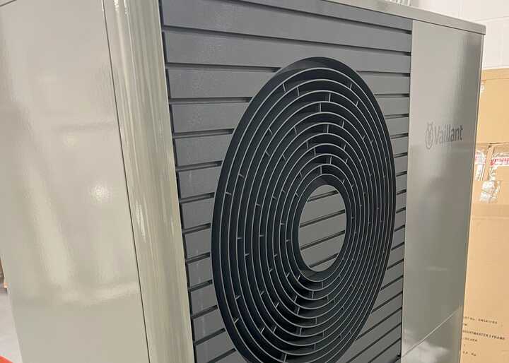 Vinyl Wrapping for a Vaillant aroTHERM Plus Air Source Heat Pump: A Custom Cement Grey Wrap for Bridport Property Renovation