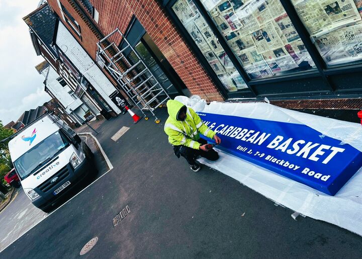 Installing 4 Meter Lightbox Fascia Sign for African &amp; Caribbean Basket 1.jpg