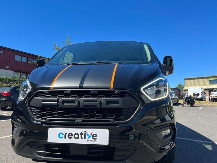 Matt Black Vehicle Graphic Stripe Over Bonnet Roof and Back of Ford Transit.jpg