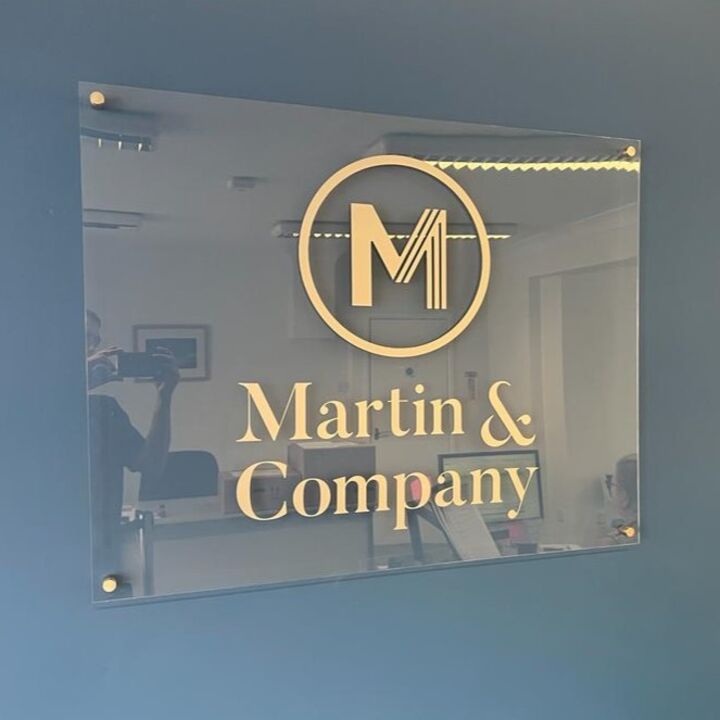 Printed Acrylic Signage with Stand off wall mounted fixings - gold text on clear perspex.jpg
