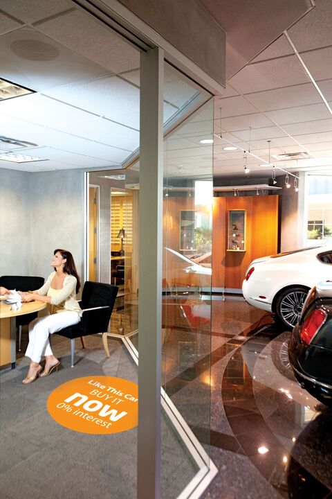 Signtac Self-Adhesive Floor Graphic in a car showroom showing car financing artwork.jpeg