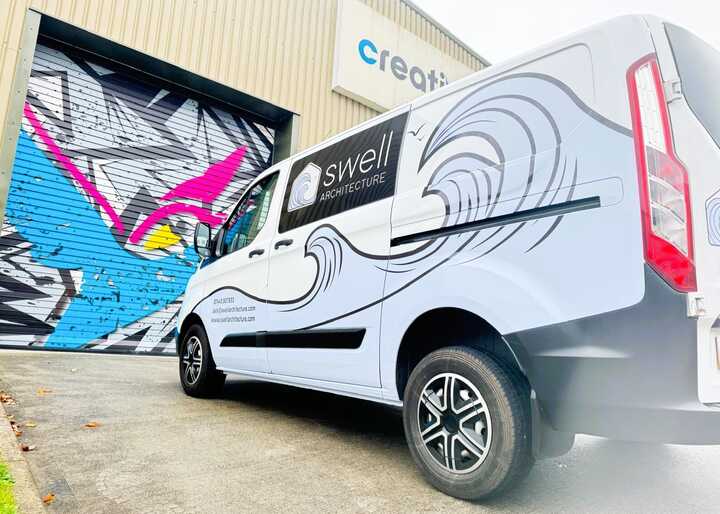 Swell Architecture's Ford Transit Custom Printed Half Wrap Wave Design and Business Information Vehicle Graphics