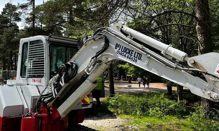 Cut Vinyl Branding Graphics for B&J Locke Ltd's Takeuchi Compact Excavator